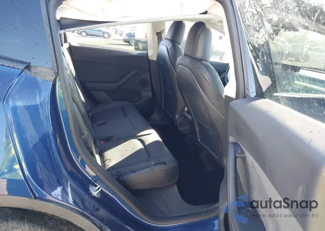 2022 Tesla Model Y Long Range Dual Motor All-Wheel Drive z USA, uszkodzony, nr VIN 7SAYGDEE0NF344188